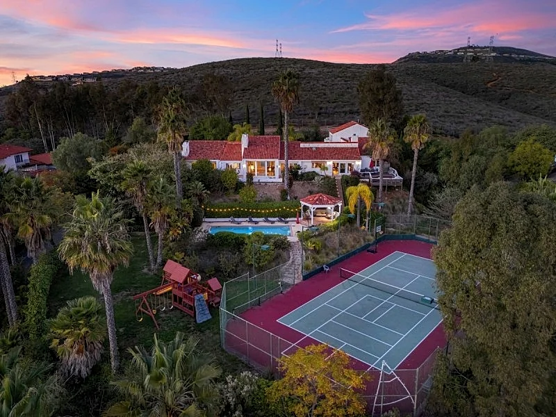 Resort-Style Estate w/ Pool, Game Room & Tennis Court | The Tennis Ranch