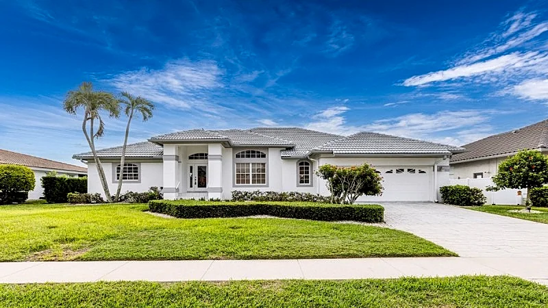 Sun-Drenched 3BR/2.5BA Waterfront Home at 1099 Dana Ct with Heated Pool & Dock