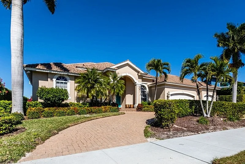 Stunning Waterfront Home at 1284 N Collier Blvd, 3BR + Den, Pool & Breathtaking Views