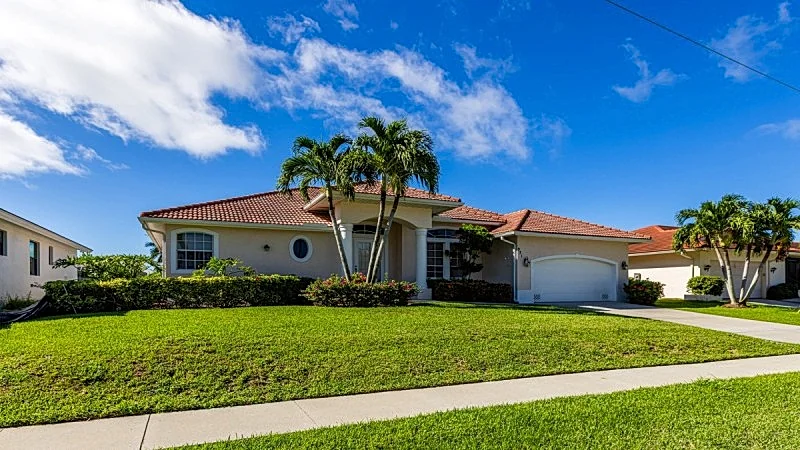 Bright Coastal 921 Ivory Court Getaway with Oversized Pool and Private Dock - Marco Island