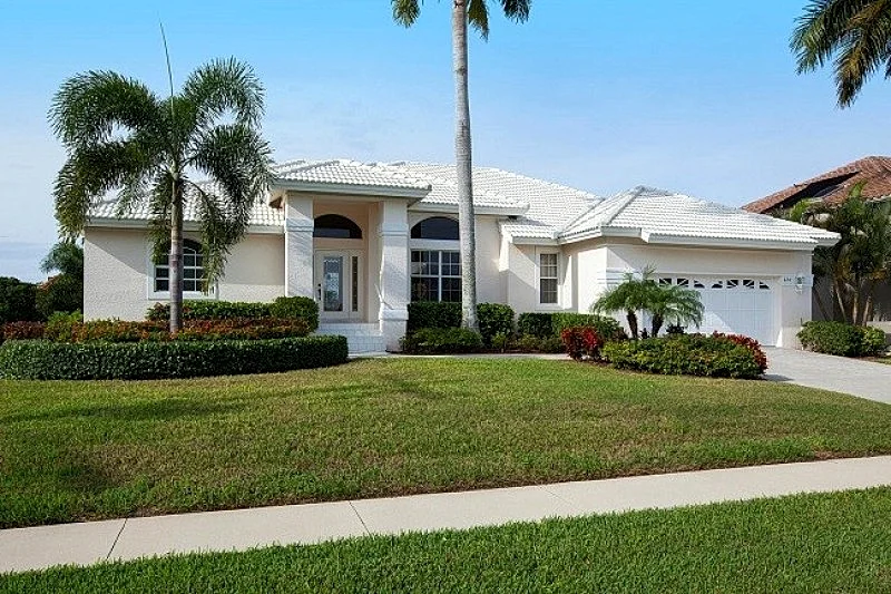 Escape to 620 Partridge Ct, Family-Friendly Waterfront Haven Near the Gulf in Marco Island