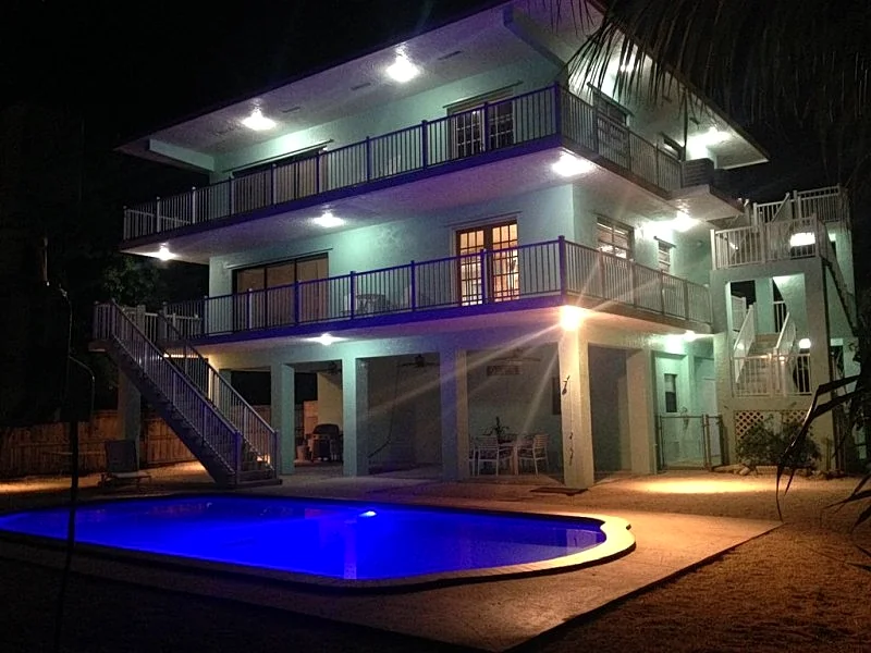 Spectacular Waterfront Ocean side 4/4 3 story home with Pool & 60 Ft Dock