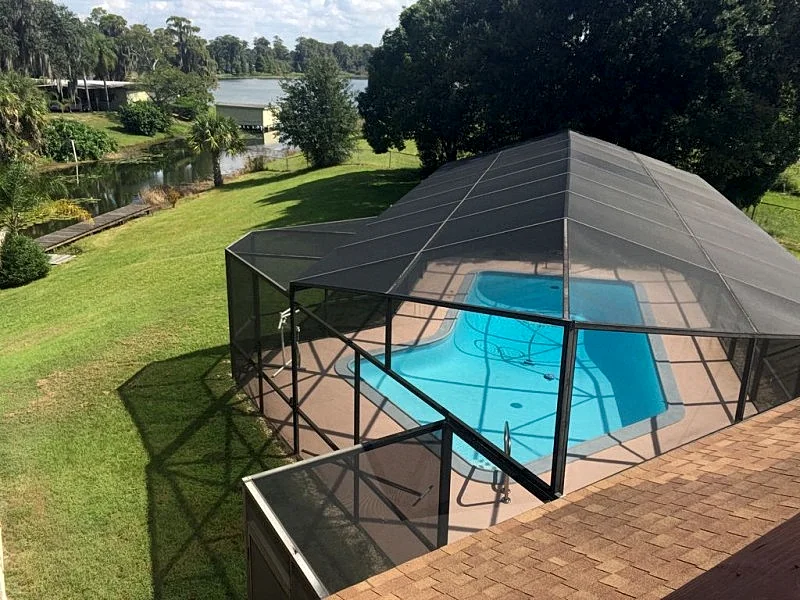 Serene Lakefront Duplex w/ boat, pool, and hot tub.
