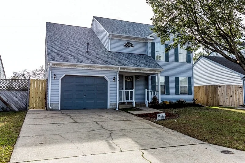 A quiet lakeside home for family, business, or both to relax or be productive.