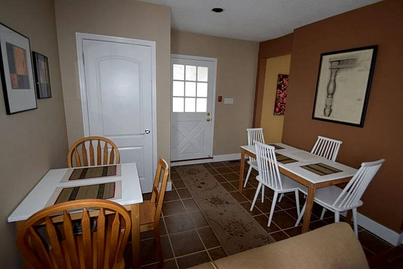 Cozy 4 Bedroom w/ Parking halfway to Downtown & Airport in Historic Toronto Neighbourhood.